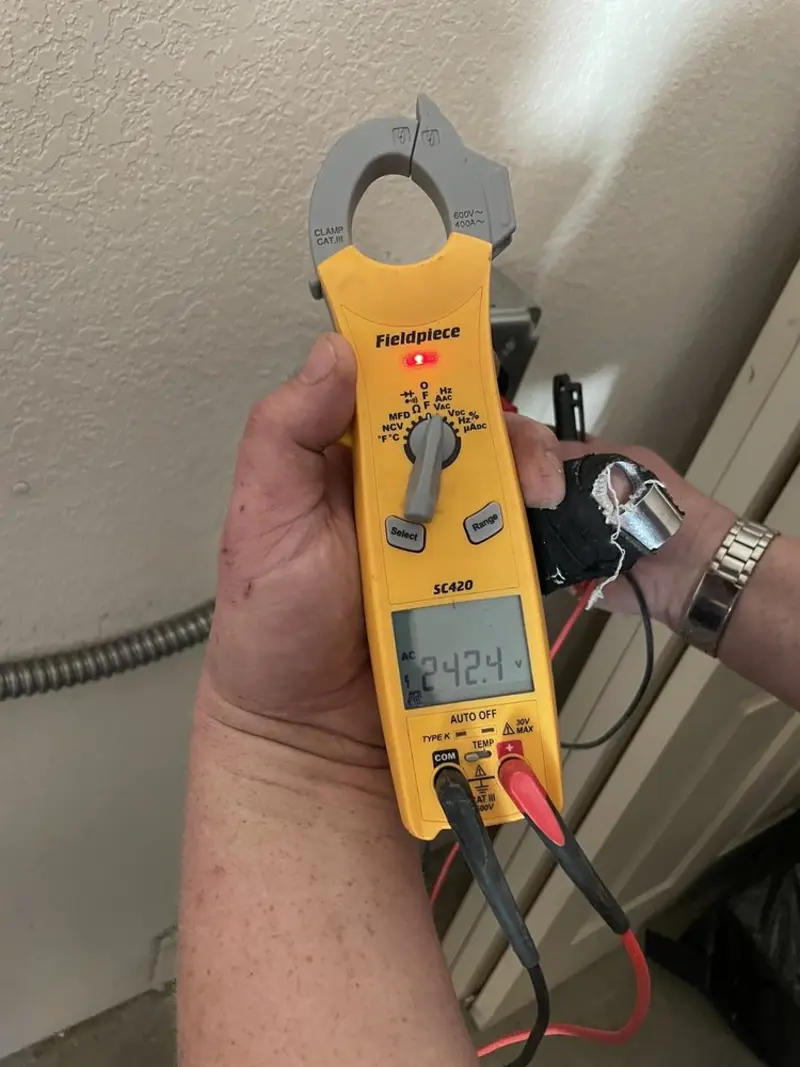 Voltage testing with clamp meter during Ceiling Fan Installation in Hillcrest Heights